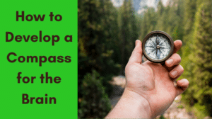 How to Develop a Compass for the Brain A hand writing in a small, pocket-sized notebook with a pen, representing the "Thinking Compass" technique for mental health recovery.