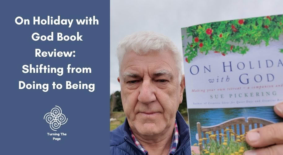 A horizontal blog header image for "Turning The Page" featuring text on the left reading, "On Holiday with God Book Review: Shifting from Doing to Being" with a spiral logo on a blue background. On the right, an older man with short white hair holds up a book titled "On Holiday with God" by Sue Pickering.